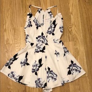 Floral romper by L’Atiste